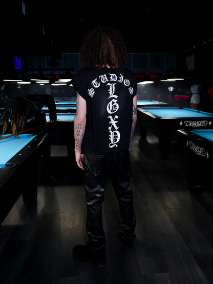 Black Mötely Crüe T-shirt by Legaxy Studios featuring band-inspired graphic print on soft cotton fabric.