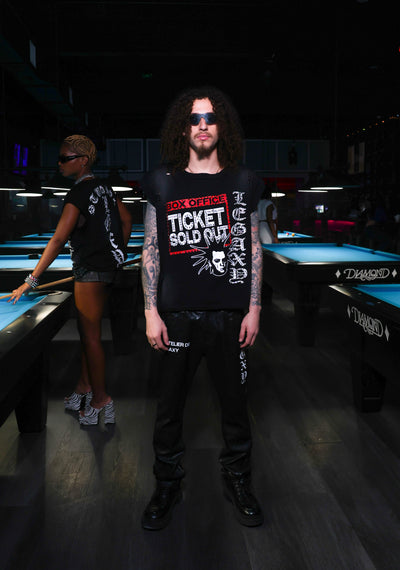 Black Mötely Crüe T-shirt by Legaxy Studios featuring band-inspired graphic design on soft cotton fabric.