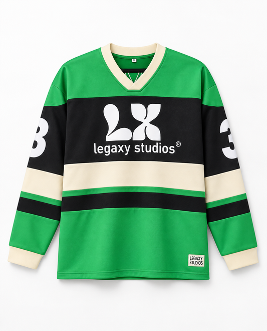 Studio Hockey Jersey by My Store featuring team logo and player number on a white and blue athletic hockey jersey.