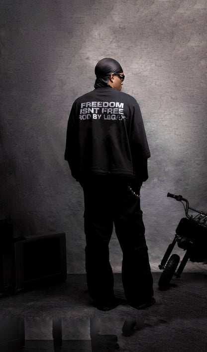Human Made War Thermal Longsleeve by Legaxy Studios, black long-sleeve shirt with printed design, close-up of fabric and logo details.