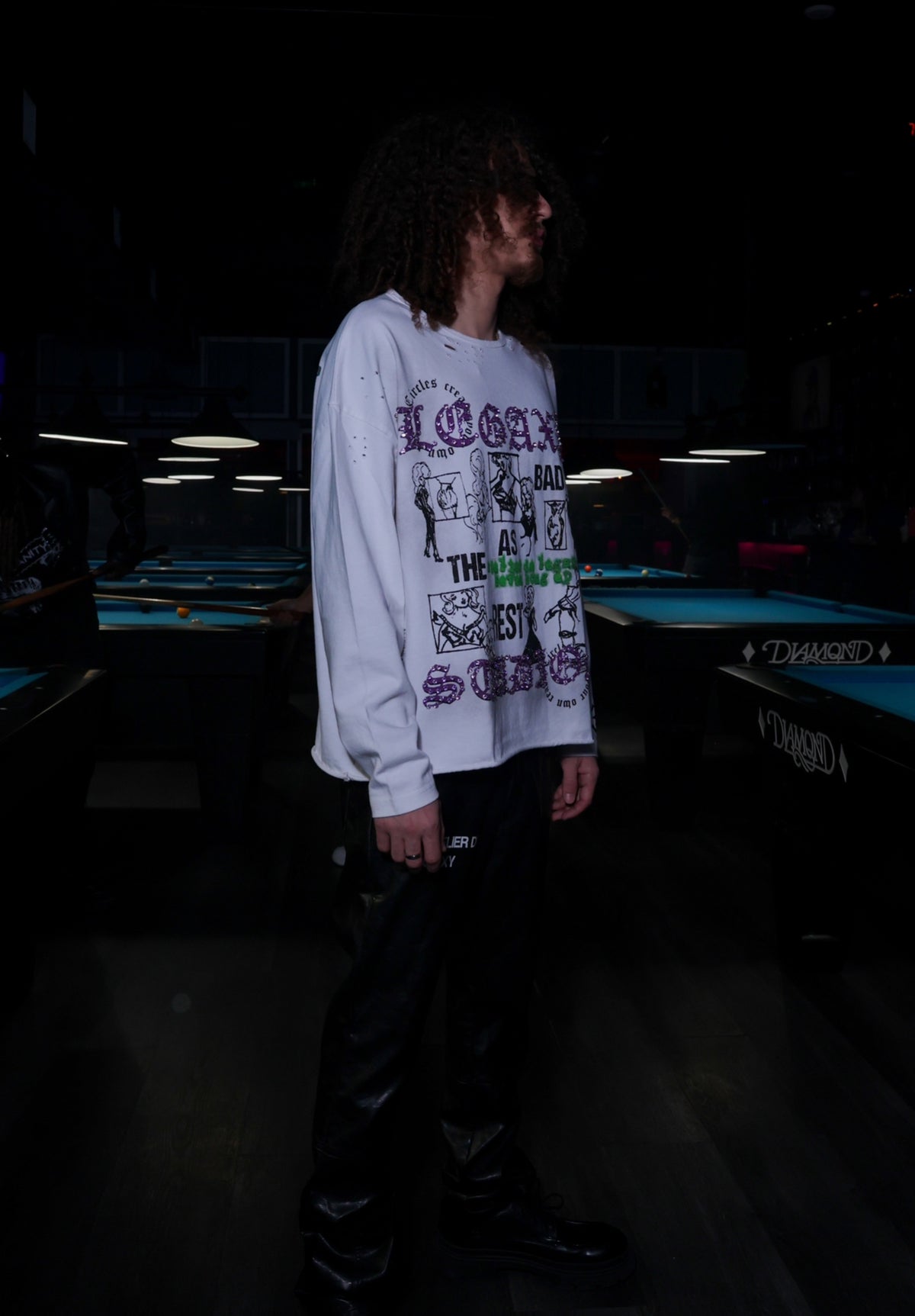 Black long sleeve T-shirt from Legaxy Studios with "As Bad As The Rest" graphic design on the front.